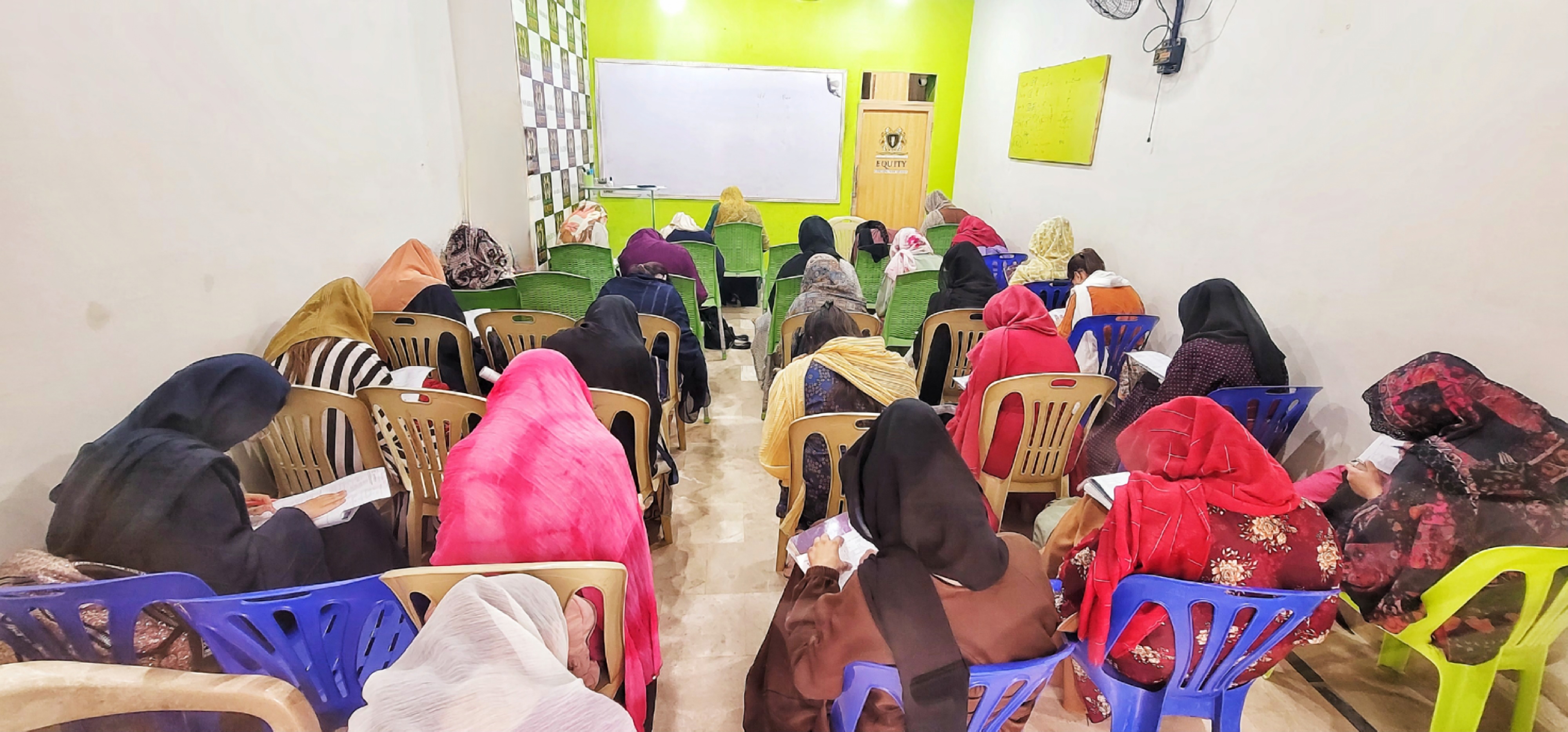A student smiling in a library